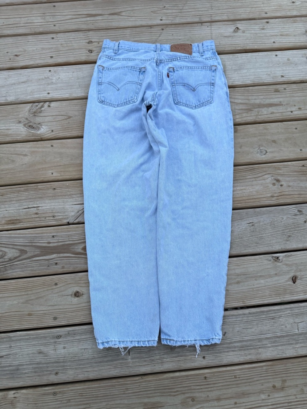 Vintage 90s Levi's 560 Distressed Baggy Light Blue Red Tab Jeans